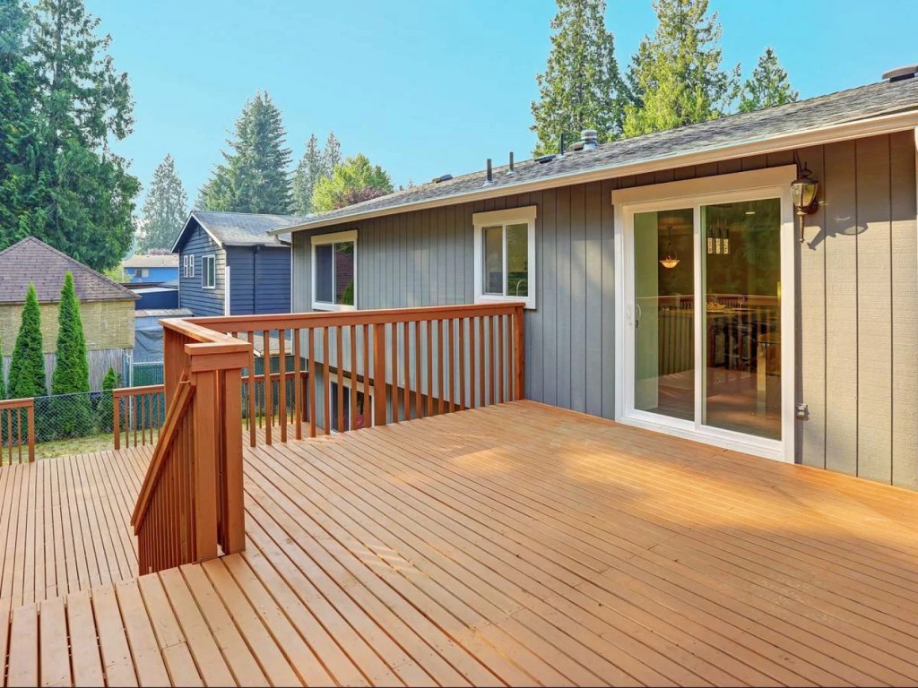 Newly crafted deck outside the back door of home in Grand Rapids, MI
