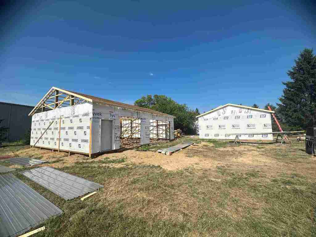 framing of Additional Space being constructed with a guest house and pole barn addition