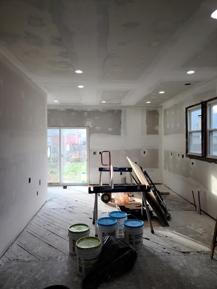 Expert home addition builders from Grand Rapids Contracting working on a project in Grand Rapids, MI.