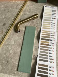 Paint Colors next to metal finishes, countertops, and backsplash for deisign purposes 